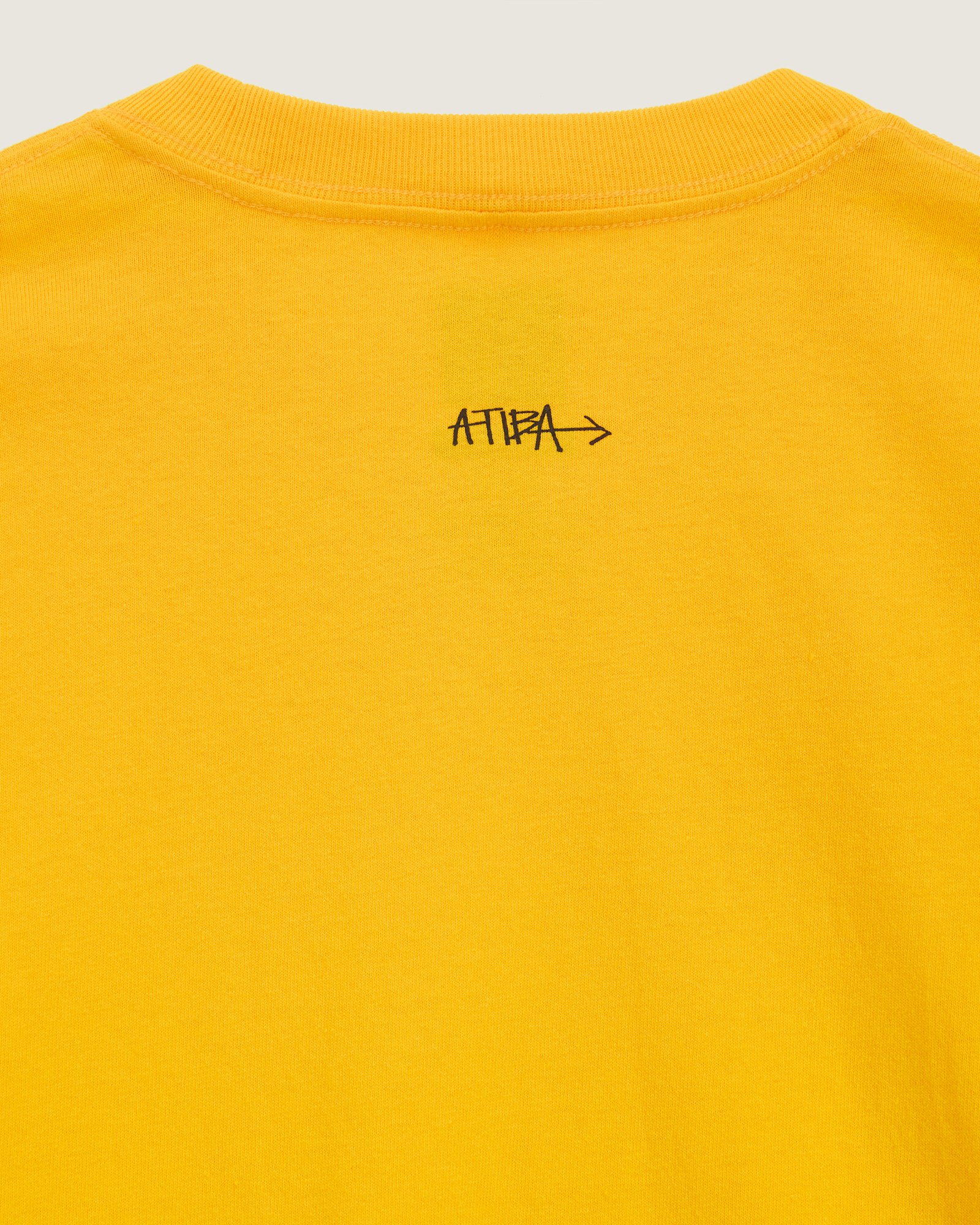 ロゴ Tシャツ by Atiba Jefferson